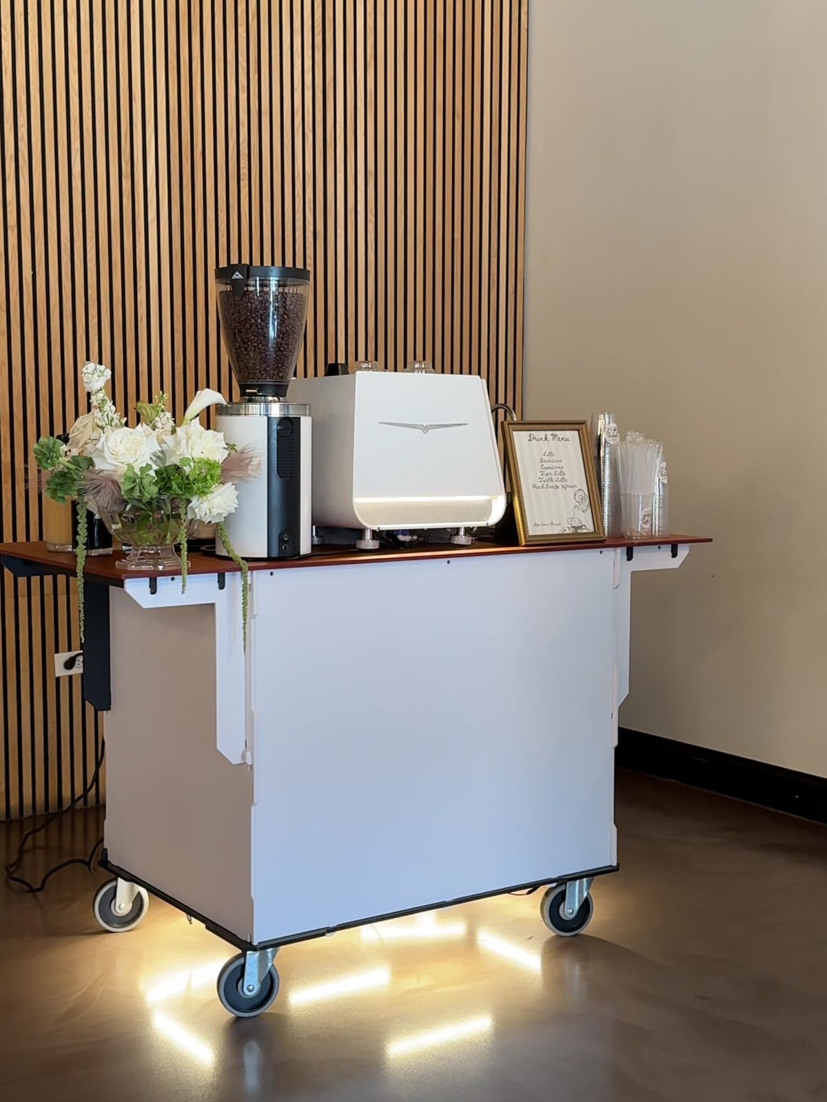 Lit cart dressed with florals for an evening event