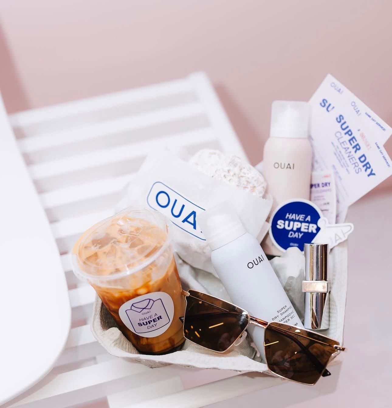 OUAI product styling with a DejaBrew drink