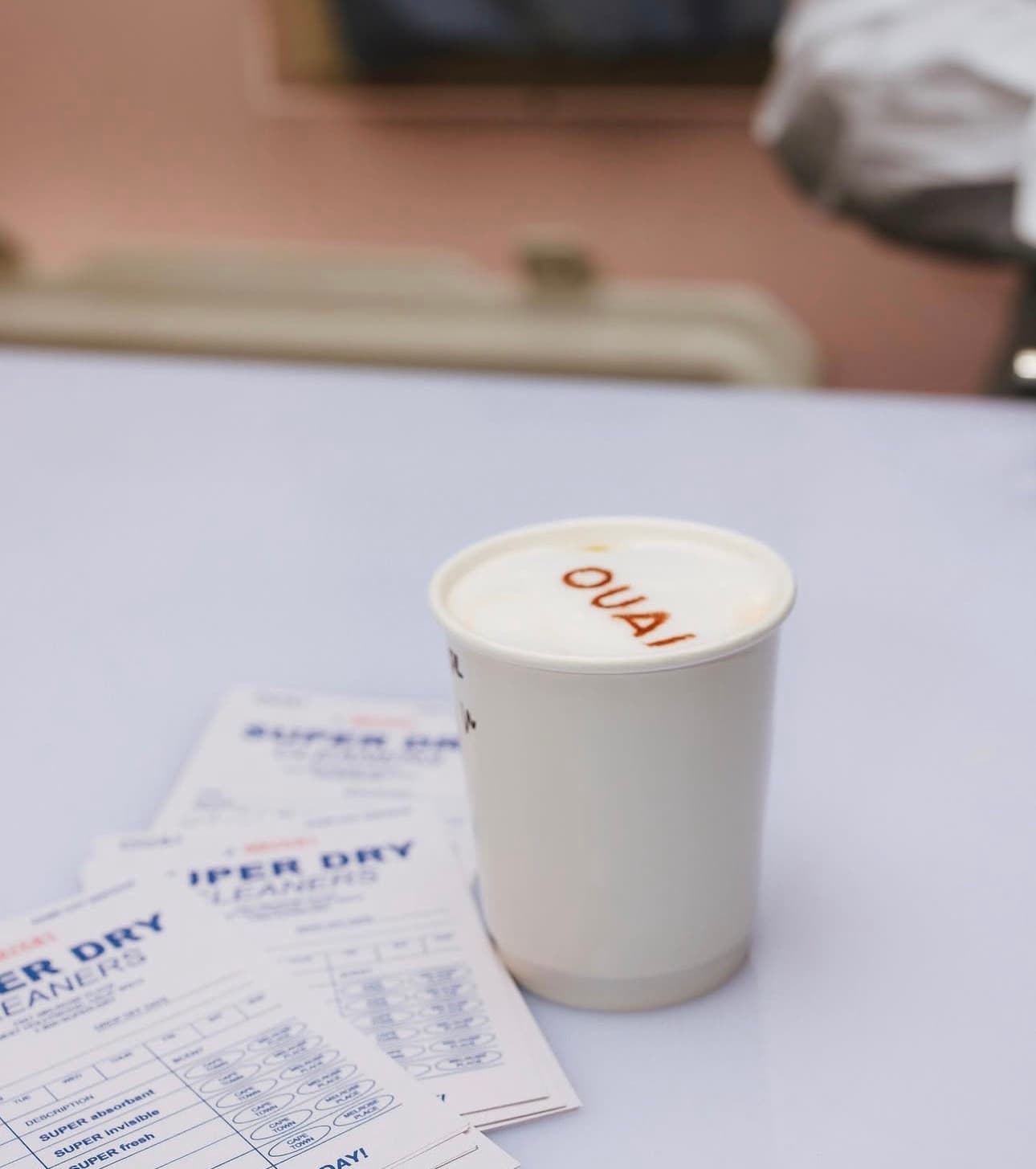 OUAI branded cup